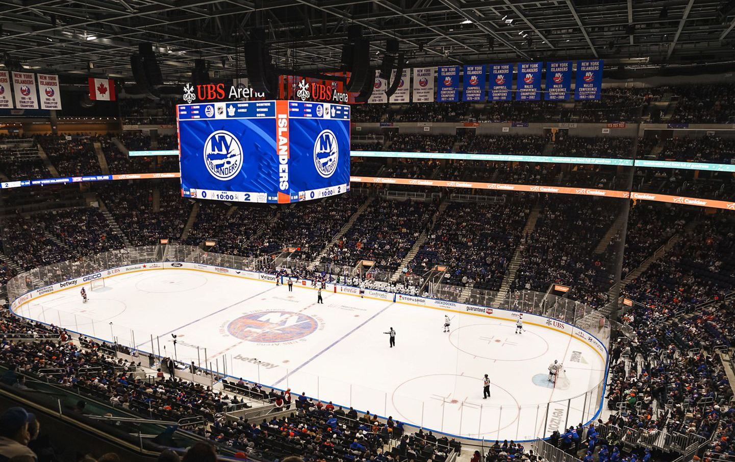 hanging jumbotron with LED ribbons in NHL arena